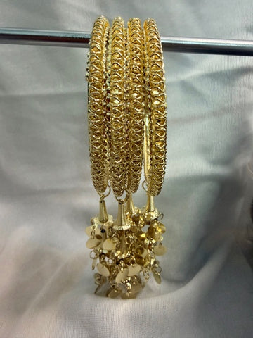 Elegant Gold-Tone Textured Bangles Set with Dangle Charms