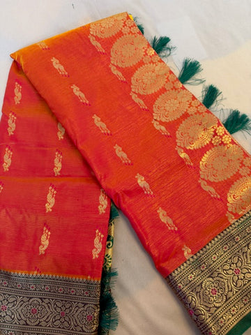 Radiant Orange Silk Saree with Rich Zari Work