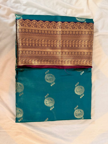 Elegant Teal and Maroon Banarasi Silk Saree