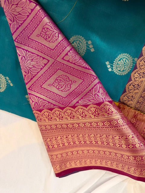 Elegant Teal and Maroon Banarasi Silk Saree